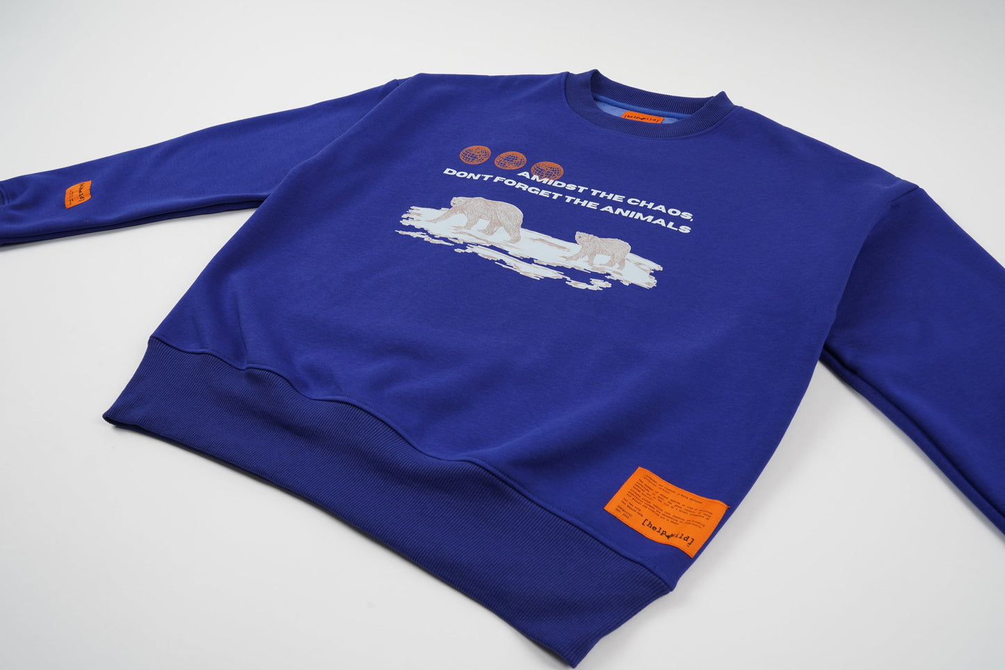 Polar Bear Endangered Species sweater or sweatshirt made of organic cotton in the streetwear style with the phrase Amidst The Chaos Don't Forget The Animals