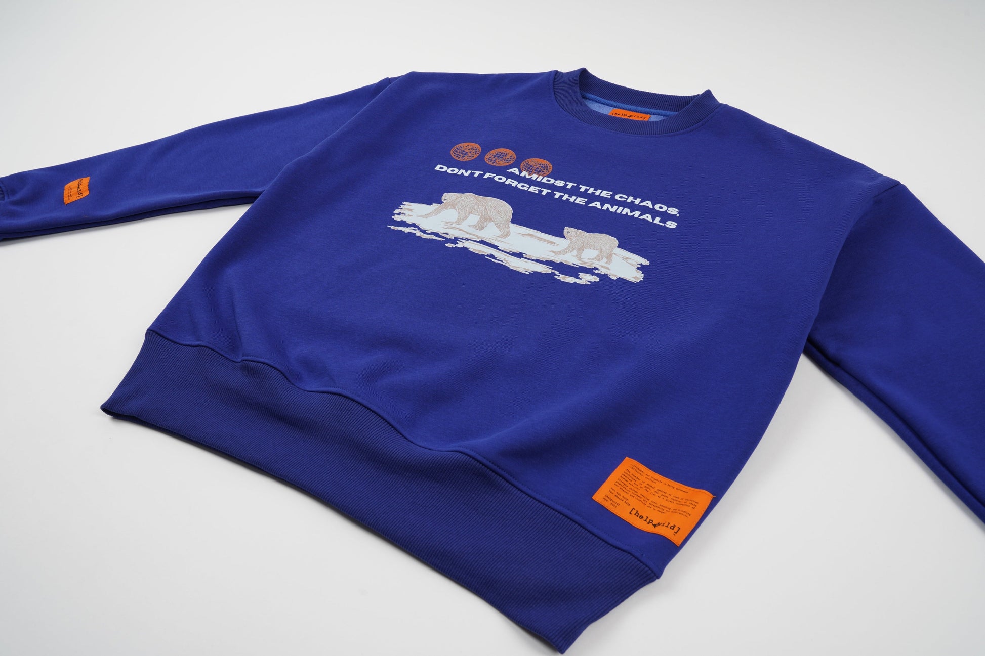 Polar Bear Endangered Species sweater or sweatshirt made of organic cotton in the streetwear style with the phrase Amidst The Chaos Don't Forget The Animals