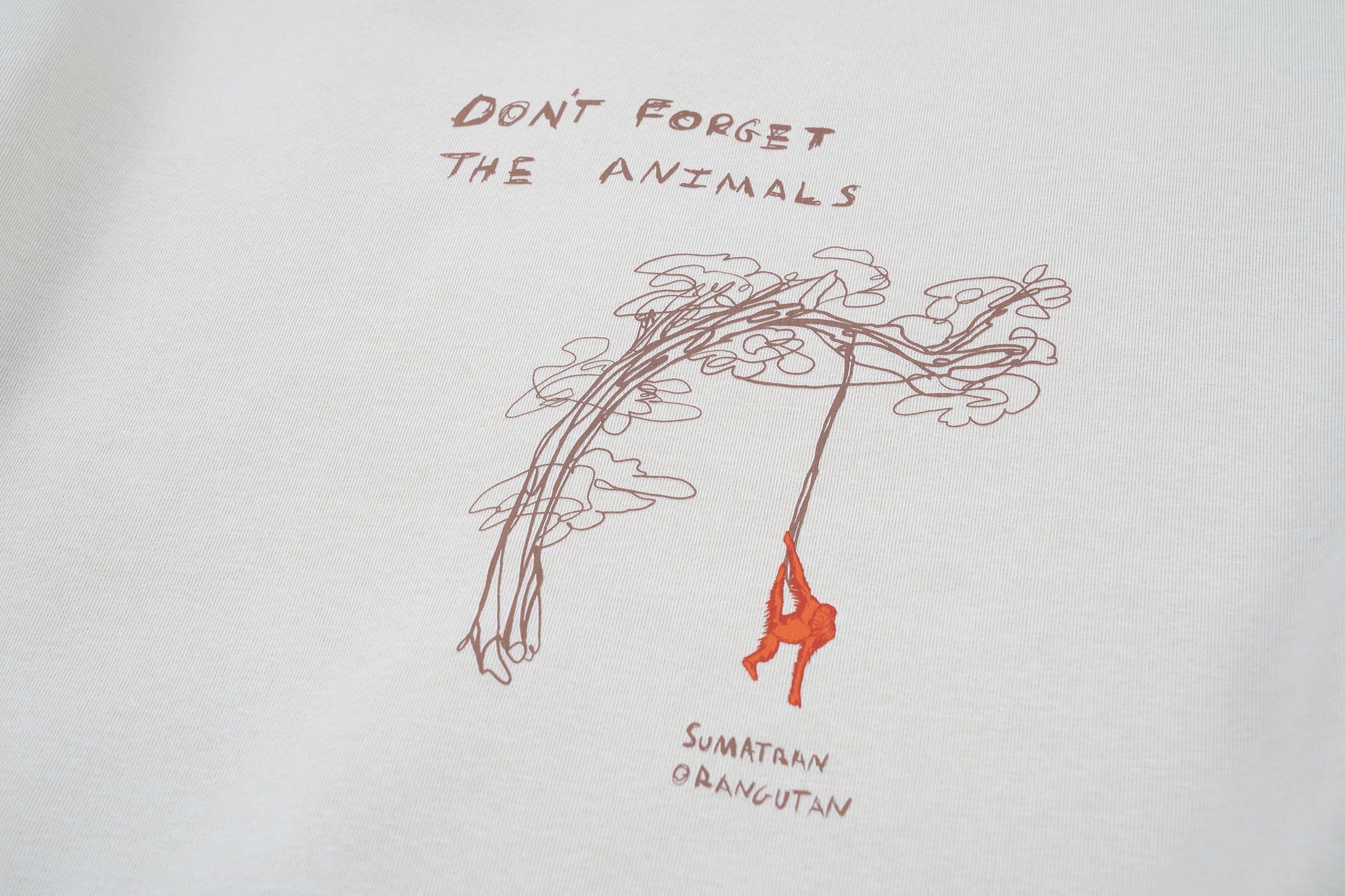 Blue Orangutan Endangered Species sweater made of organic cotton in the streetwear style with the phrase Don't Forget The Animals