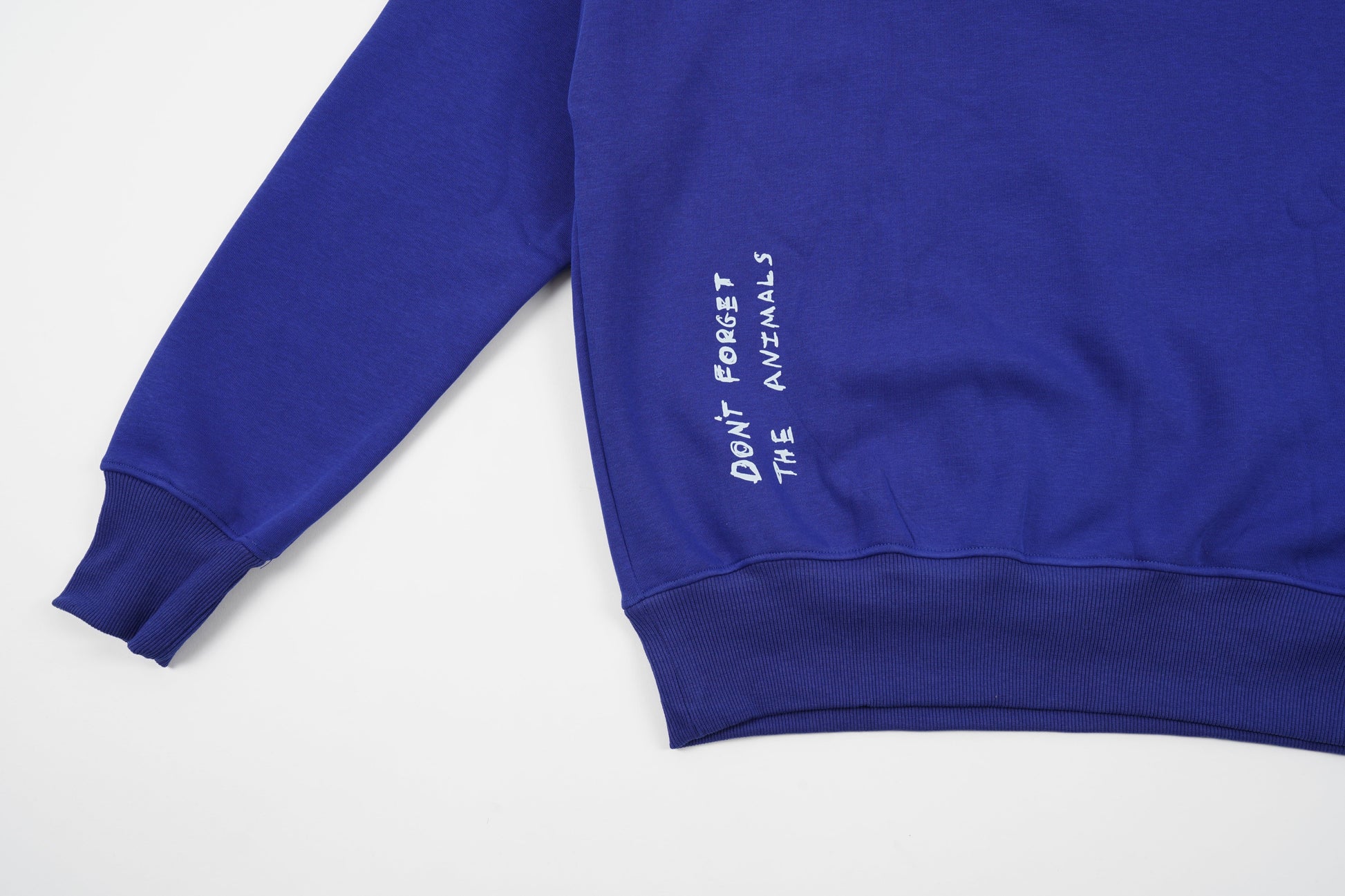 Blue Orangutan Endangered Species sweater made of organic cotton in the streetwear style with the phrase Don't Forget The Animals